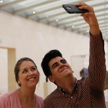 Curator Leigh Arnold takes a selfie with Ben Vega Curator Leigh Arnold takes a selfie with Ben Vega